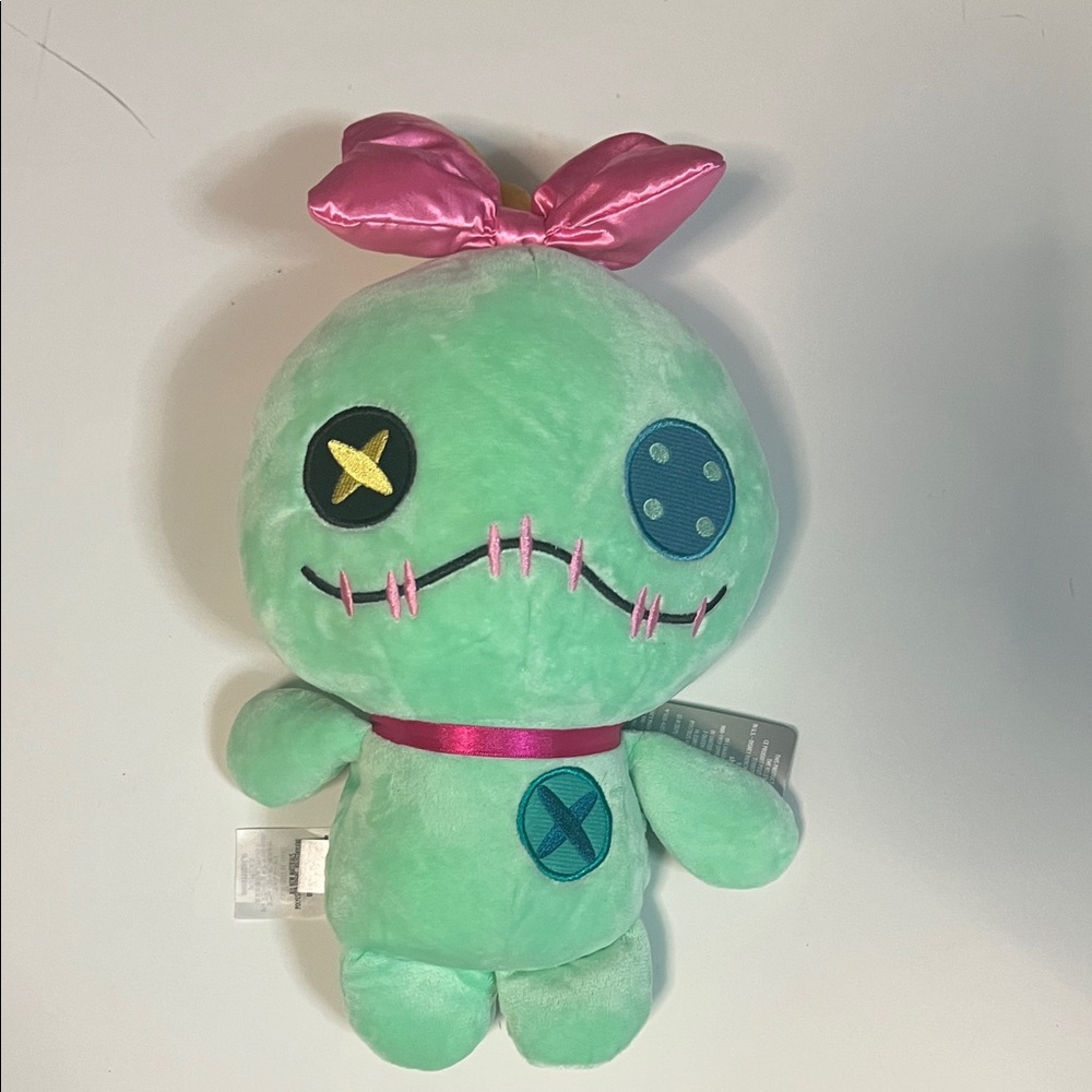 Disney Green Plush Toy with Pink Accents
